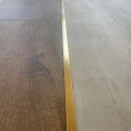 Profil trecere T inox 15x9x2700 mm auriu mat / periat - la nivel - PT15AB